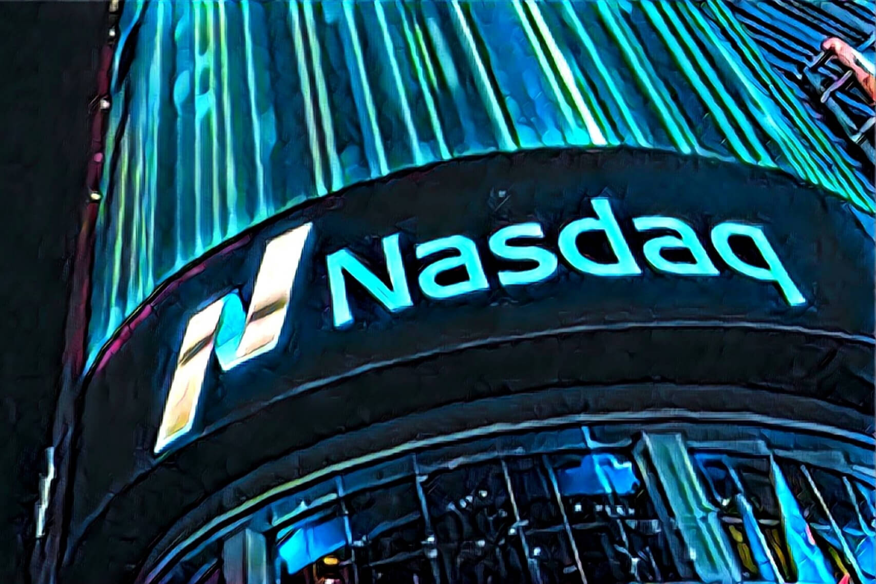 A nasdaq sign lit up in the night.